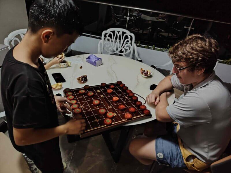 Playing Chinese Chess at Homestay